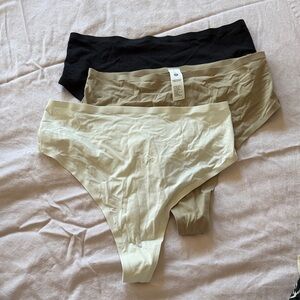 lululemon athletica Black, Tan, and Cream high rise thongs